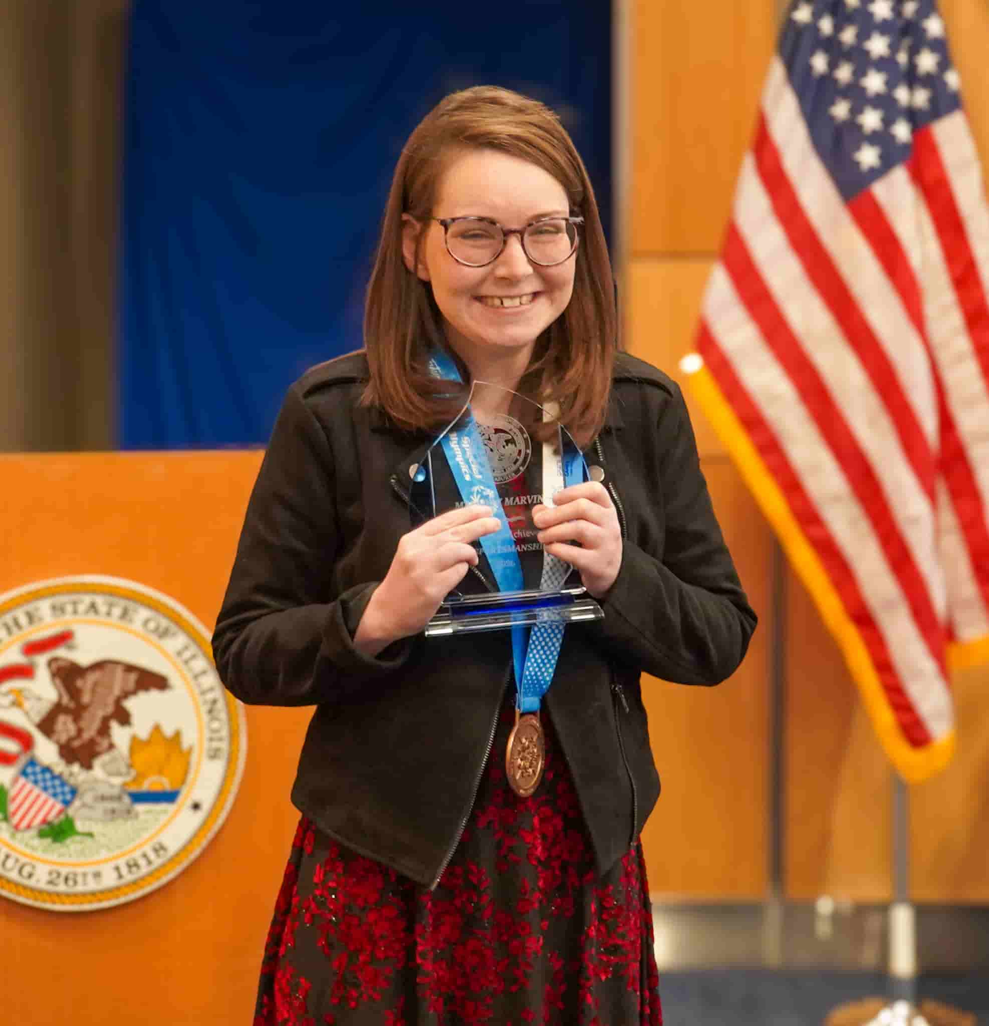 Christopher Mallette with award at Black History Month Event