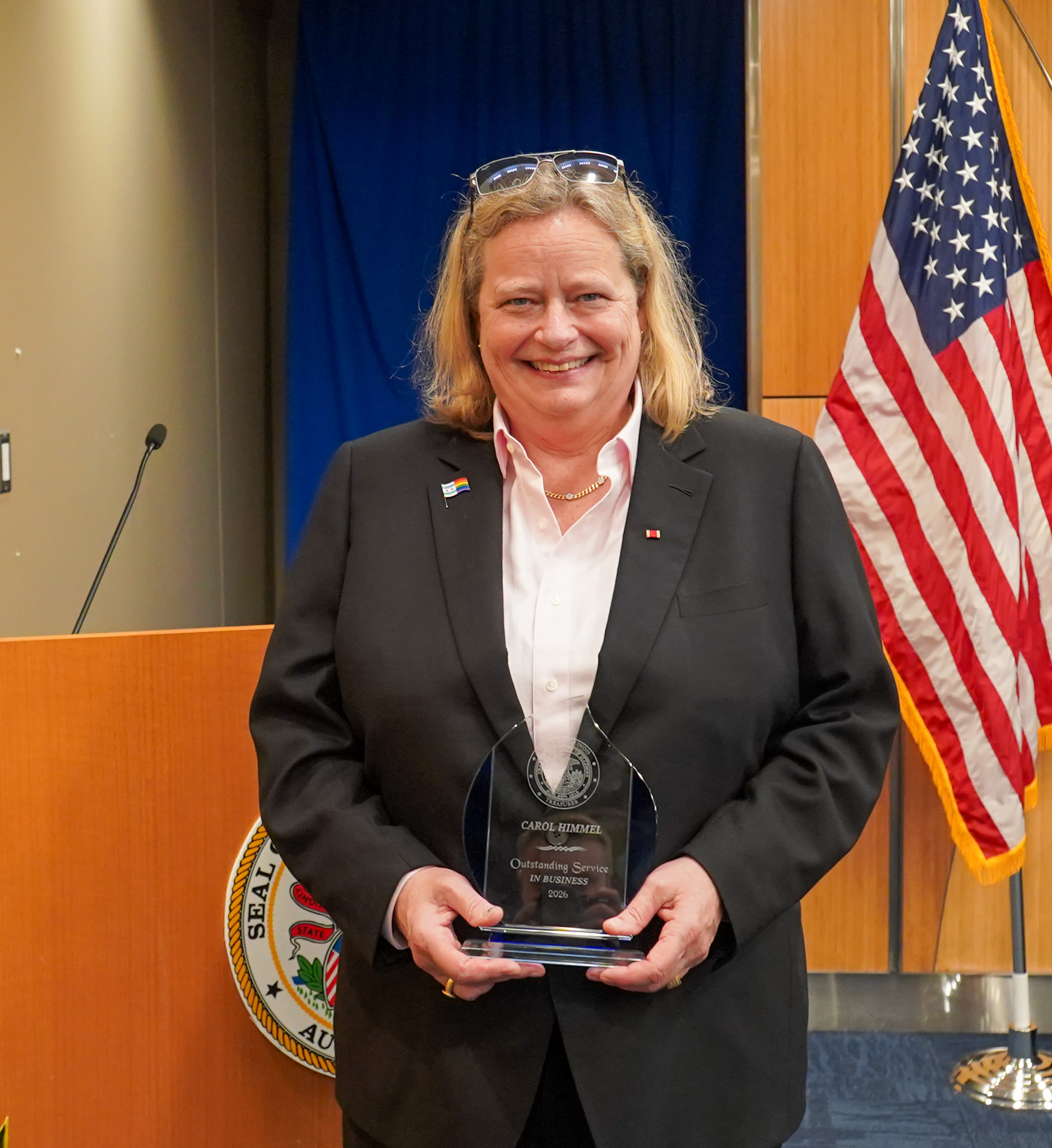 Christy George with her award at Treasurer Frerichs' Black History Month celebration