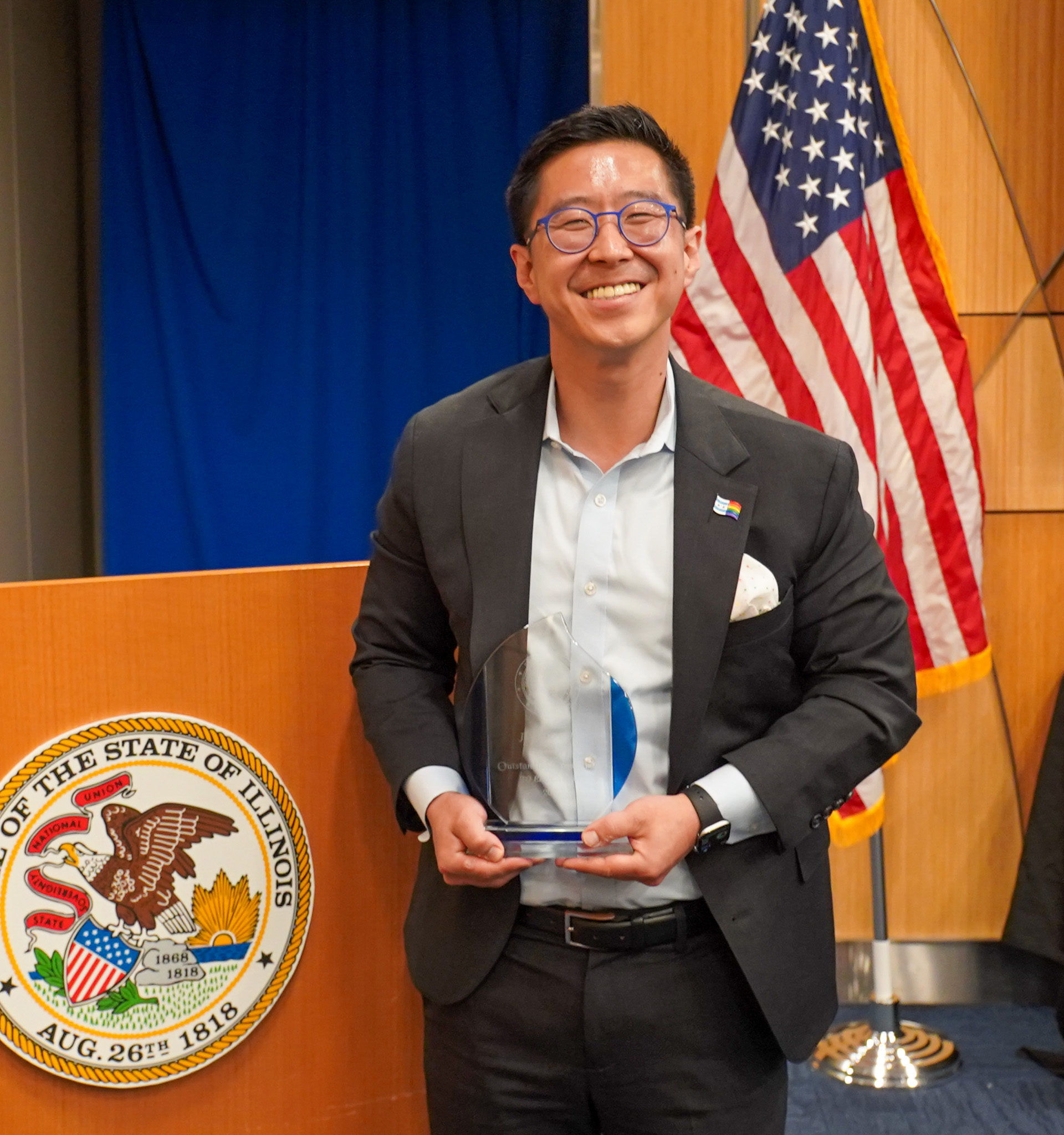 Christopher Mallette with award at Black History Month Event