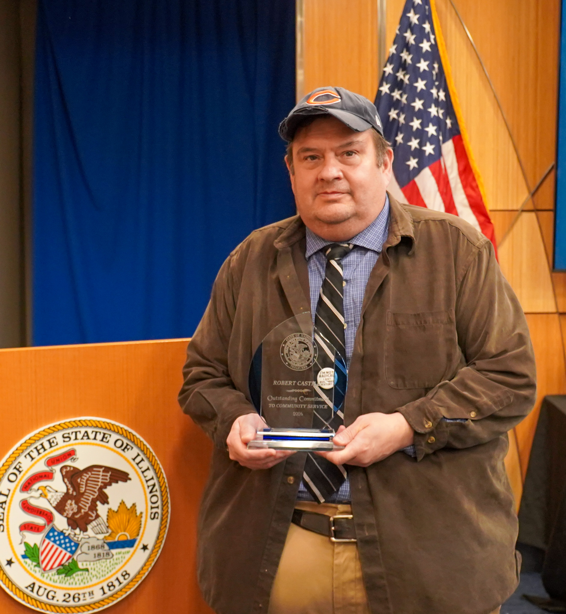 Christy George with her award at Treasurer Frerichs' Black History Month celebration
